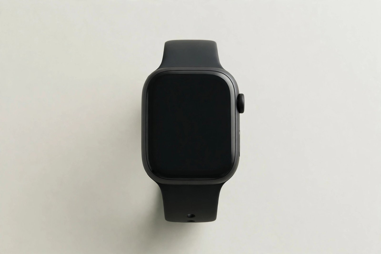 Smartwatch with a plain watch face on a plain light background