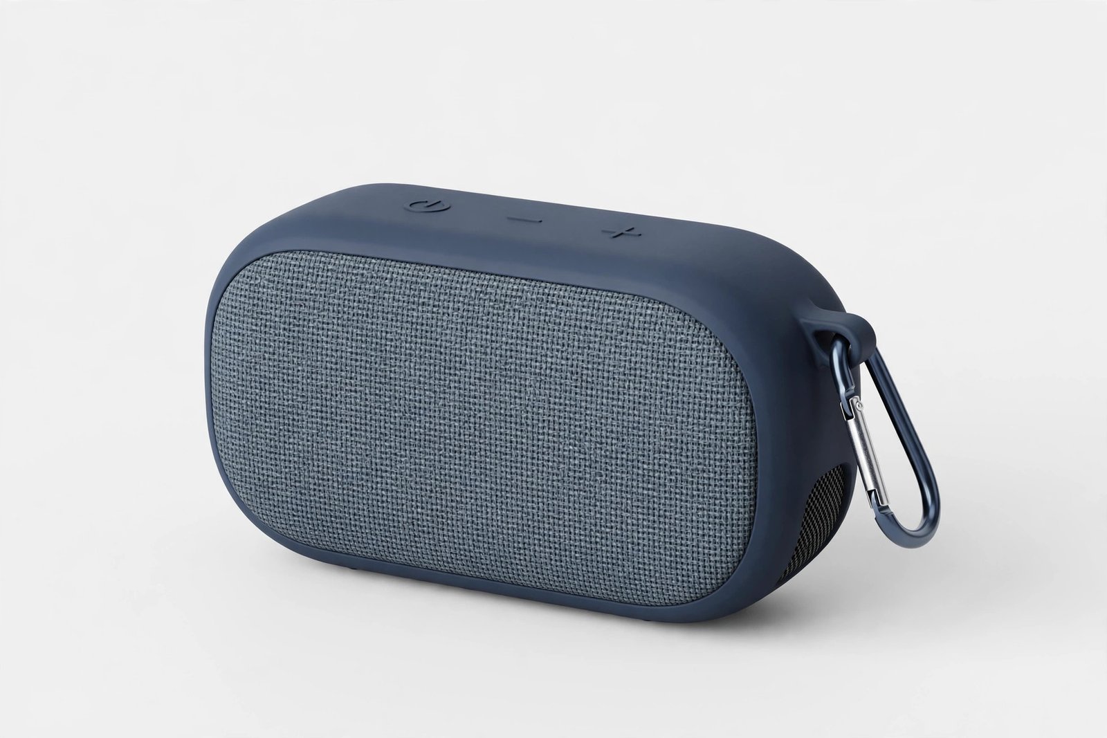Small portable Bluetooth speaker on a plain light background