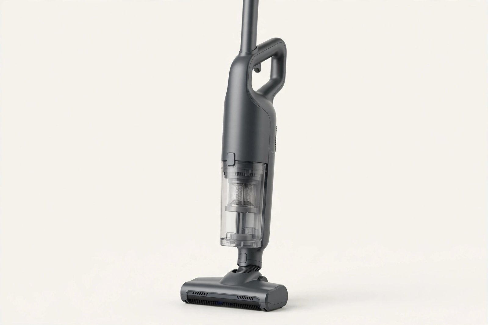 Handheld cordless vacuum cleaner with a dust container on a light background