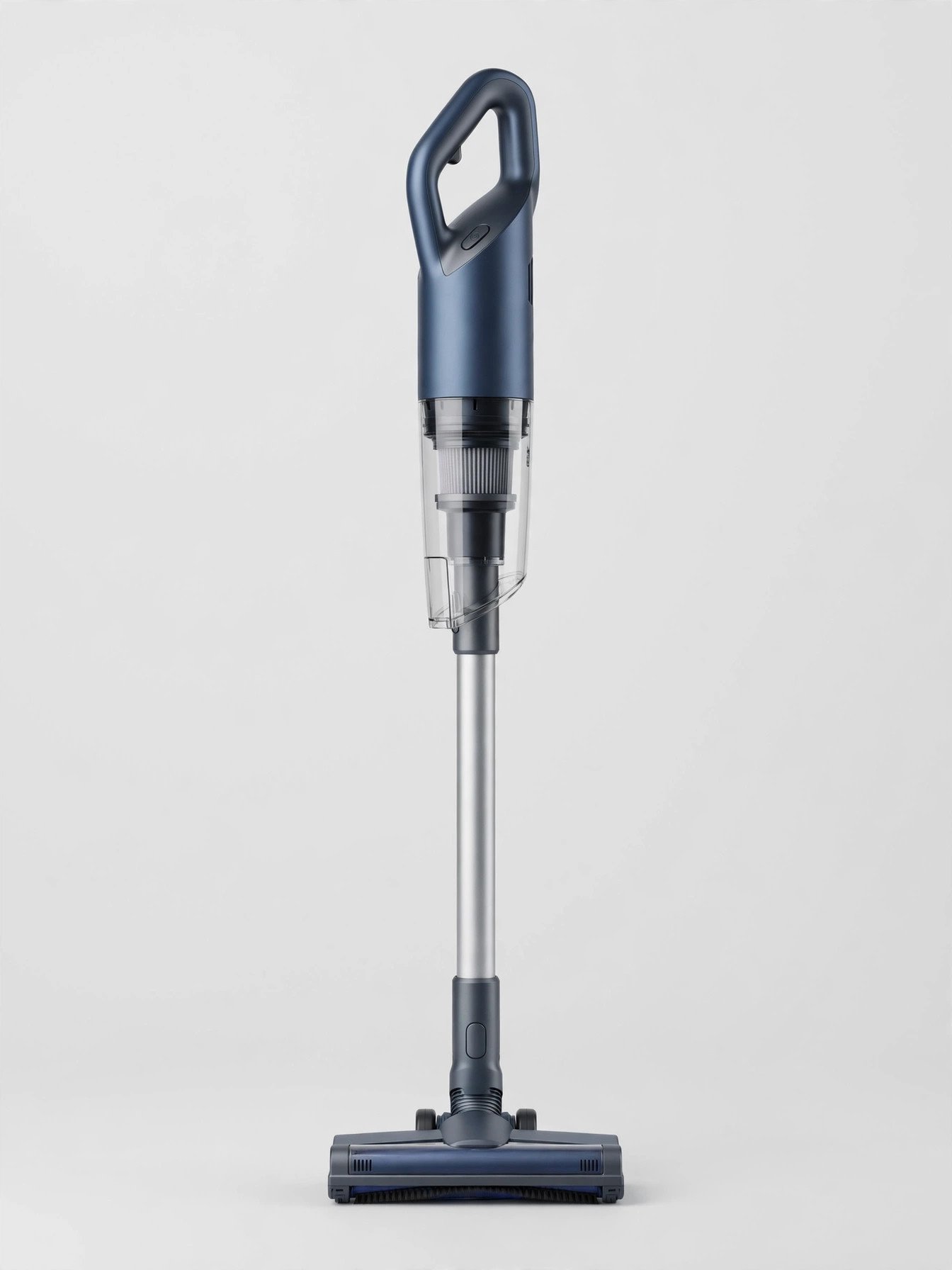 Slim cordless stick vacuum cleaner standing upright on a light background