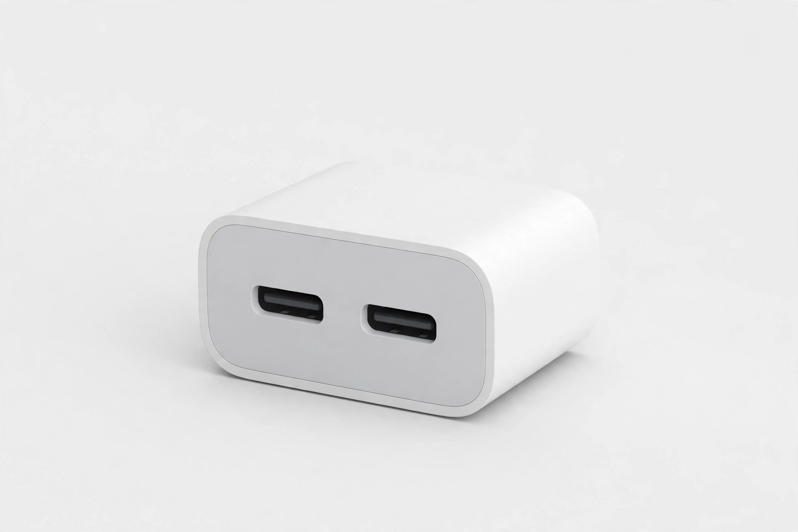 Compact GaN USB-C fast charger with two ports on a plain light background